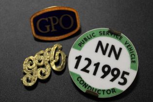 A BLUE AND ORANGE ENAMEL GPO BADGE -NO PIN TOGETHER WITH ANOTHER AND A PUBLIC SERVICE CONDUCTOR