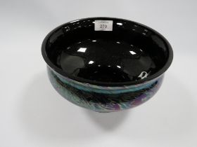 AN OCHRE STYLE GLASS FOOTED BOWL