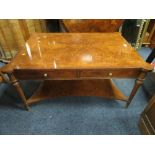 A QUALITY REPRODUCTION WALNUT COFFEE TABLE WITH DRAWERS