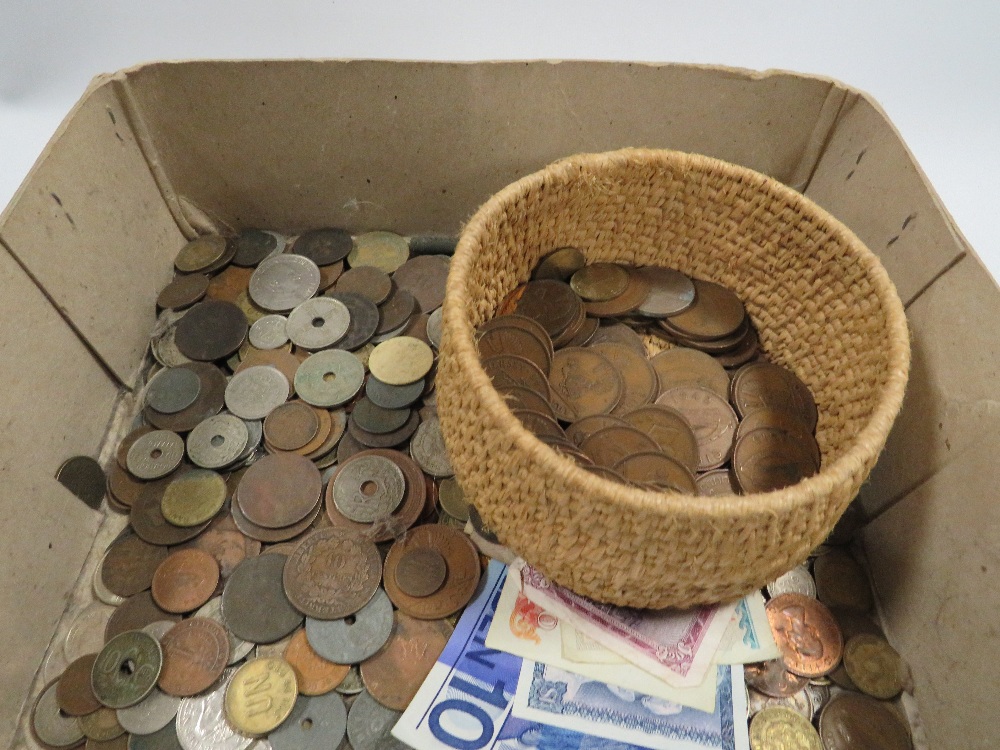 A BOX OF WORLD COINS AND BANKNOTES