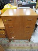 A MID CENTURY TEAK FOUR DRAWER CHEST - W 68.5 CM