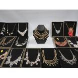 A COLLECTION OF NEW BOXED COSTUME JEWELLERY NECKLACES