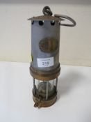 A VINTAGE MINERS LAMP