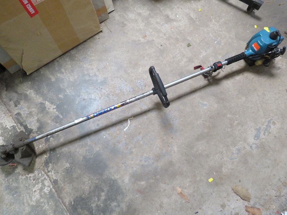 A PETROL MAKITA STRIMMER