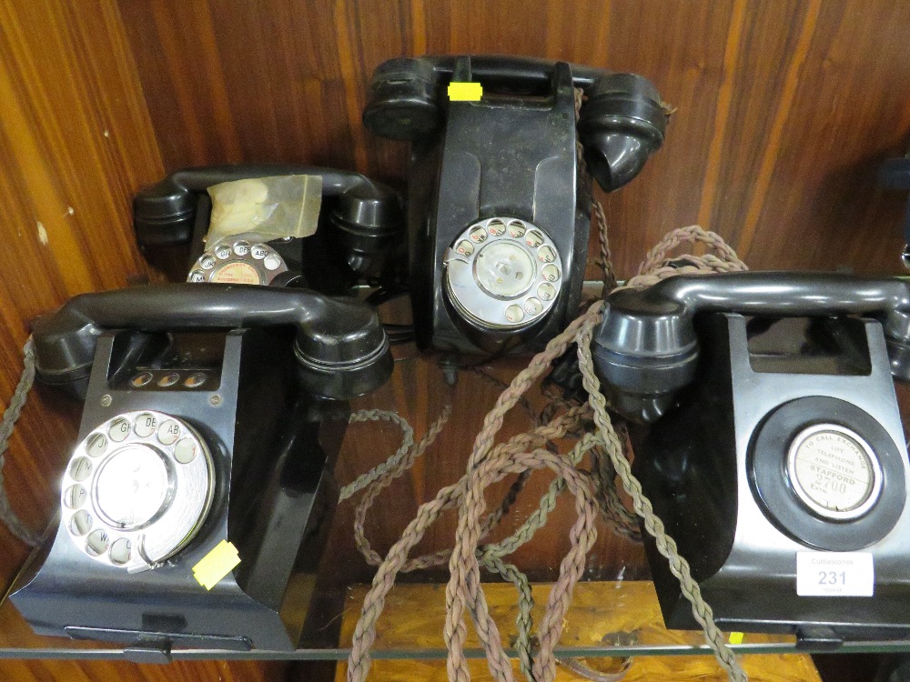 FOUR ASSORTED VINTAGE TELEPHONES TOGETHER WITH A PACKET OF DIALS