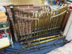 AN ANTIQUE HEAVY BRASS DOUBLE BED FRAME WITH IRONS