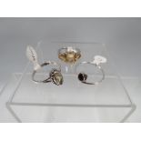 THREE ASSORTED SILVER DRESS RINGS