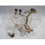 A QUANTITY OF SILVER AND WHITE METAL JEWELLERY , INCLUDING A CHARM BRACELET, ALONG WITH FAUX