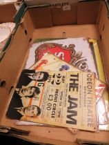 A BOX OF METAL ADVERTISING SIGNS