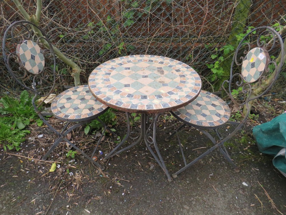 A MOSAIC STYLE FOLDING GARDEN PATIO . BISTRO SET COMPRISING A TABLE & TWO CHAIRS