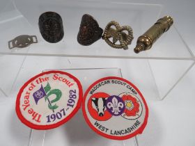 A SMALL COLLECTION OF SCOUT MEMORABILIA TO INCLUDE AN ANTIQUE BOYS SCOUT WHISTLE, TWO RINGS
