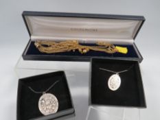 A HALLMARKED SILVER OVAL PENDANT TOGETHER WITH A PLATED EXAMPLE AND A GOLD PLATED NECKLACE (3)