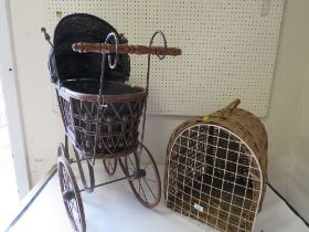 A VINTAGE WICKER PET CARRIER TOGETHER WITH A VINTAGE STYLE DOLLS PRAM (2)