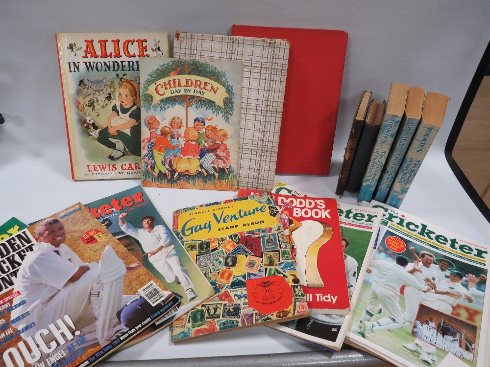 A TRAY OF VINTAGE BOOKS AND ANNUALS TO INCLUDE A GAY VENTURE STAMP ALBUM AND CONTENTS