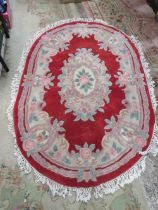 A LARGE MODERN CHINESE WOOLLEN RUG 185 x 122 cm