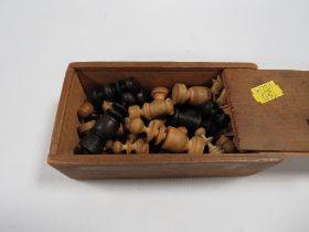 A VINTAGE BOXED WOODEN CHESS SET