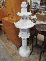 AN UNUSUAL RESIN ORIENTAL PAGODA STYLE STAND - H 132 CM