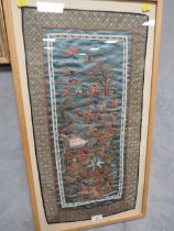 A FRAMED ORIENTAL DECORATIVE SILK PANEL