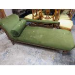 AN EDWARDIAN UPHOLSTERED CHAISE LONGUE