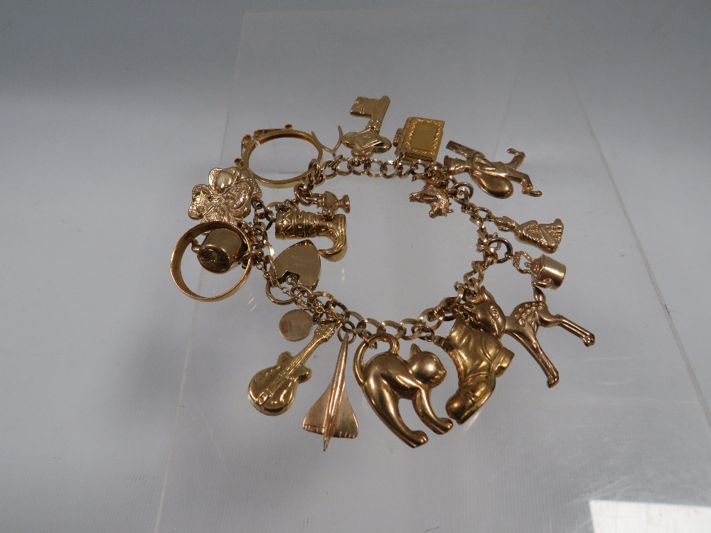 A HALLMARKED 9 CARAT GOLD CHARM BRACELET approx weight 41.6G - Image 6 of 6