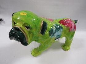 A NOVELTY PAINTED FIGURE OF A BULL DOG PUPPY