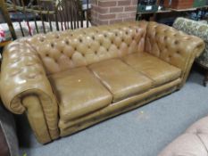 A LIGHT TAN LEATHER CHESTERFIELD SETTEE A/F