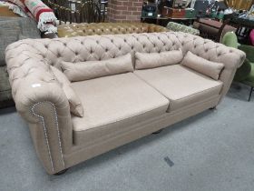 A MODERN UPHOLSTERED CHESTERFIELD SETTEE