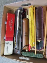A TRAY OF ASSORTED MUSICAL INSTRUMENTS TO INCLUDE A CASED BASS RECORDER TOGETHER WITH A CASED