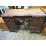 A MAHOGANY TWIN PEDESTAL DESK WITH INSET LEATHER TOP - W 121 CM A/F