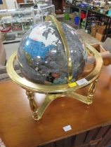 A MODERN GLOBE ON STAND