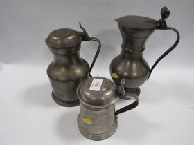 THREE LIDDED PEWTER TANKARDS