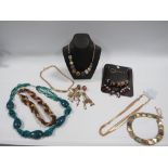 A LARGE QUALITY OF COSTUME JEWELLERY MAINLY NECKLACES