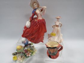 A ROYAL DOULTON FIGURINE "AUTUMN BREEZES " ETC (4)