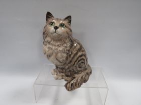 A BESWICK LARGE SWISS ROLL SEATED CAT