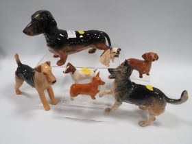 A SELECTION OF BESWICK AND OTHER DOG FIGURES (7)