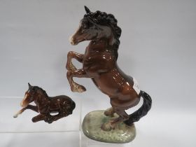 A BESWICK HORSE FIGURE OF A WELSH REARING COB TOGETHER WITH A FOAL A/F