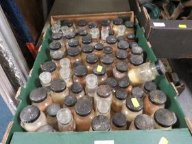 A TRAY OF PHARMACY BOTTLES AND CONTENTS