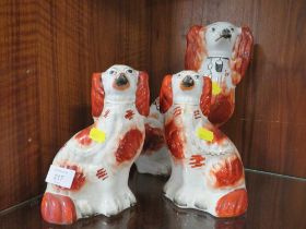 THREE STAFFORDSHIRE STYLE SPANIELS