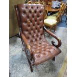 A REPRODUCTION MAHOGANY ARMCHAIR A/F