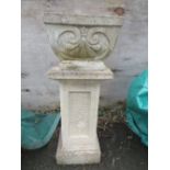 A SANDSTONE PEDESTAL PILLAR PLANTER