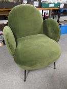 A MODERN UPHOLSTERED GREEN CHAIR