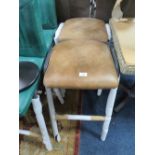 A PAIR OF TAN LEATHER KITCHEN / BAR STOOLS