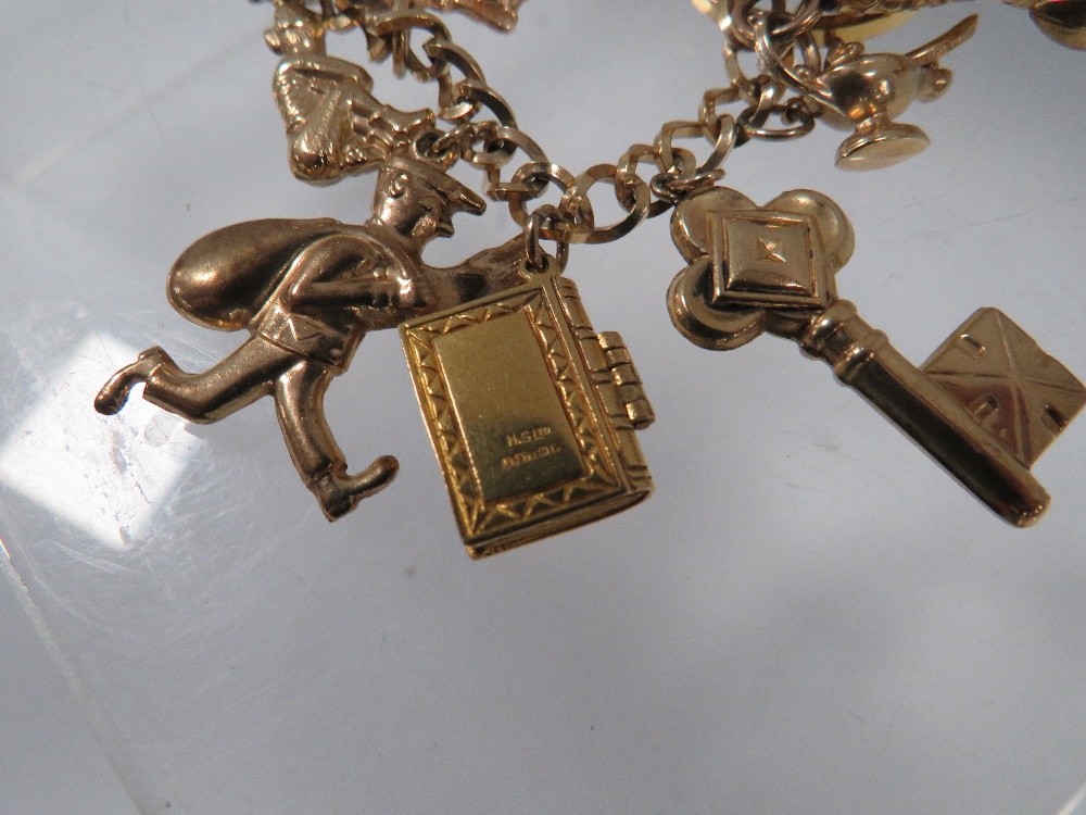 A HALLMARKED 9 CARAT GOLD CHARM BRACELET approx weight 41.6G - Image 3 of 6