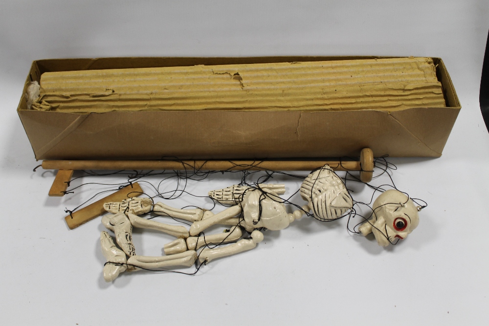 A VINTAGE PELHAM PUPPET IN THE FORM OF A SKELETON IN ORIGINAL BOX A/F