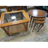 A WALNUT NEST OF TABLES & A MODERN GLASS TOPPED TABLE (2)