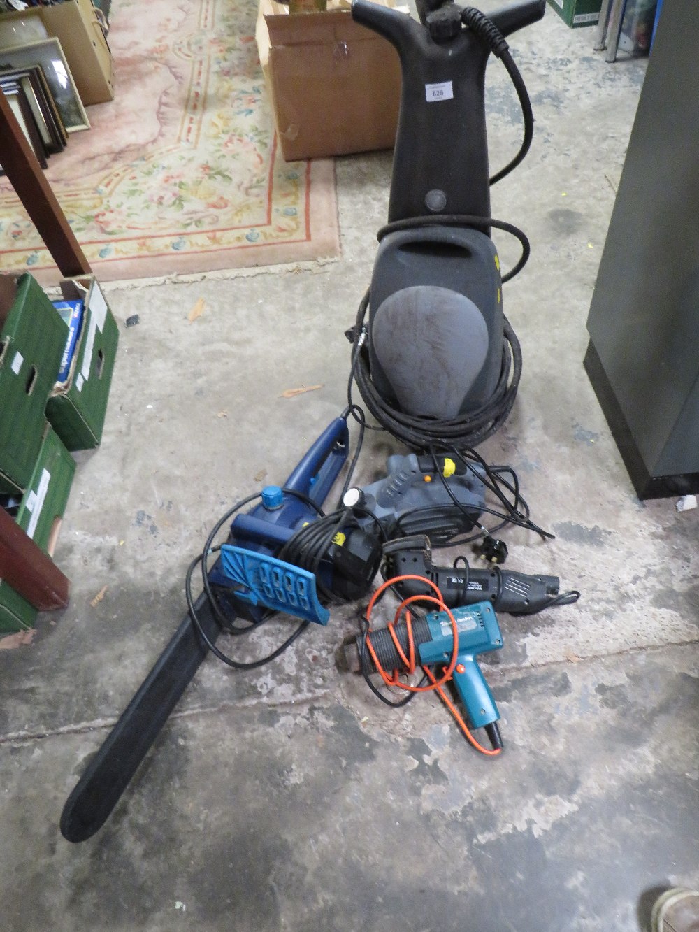 A QUANTITY OF ELECTRICAL TOOLS TO INCLUDE A CHAINSAW, A POWER WASHER AND A PLANER ETC