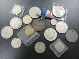 A GROUP OF COLLECTORS COINS AND TOKENS