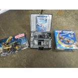 THREE BOXED MECCANO SETS TO INCLUDE EVOLUTION MULTI MODELS AND A CASED MECHANICAL WORKSHOP -