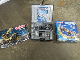 THREE BOXED MECCANO SETS TO INCLUDE EVOLUTION MULTI MODELS AND A CASED MECHANICAL WORKSHOP -
