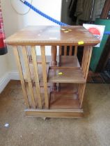 AN EDWARDIAN MAHOGANY INLAID REVOLVING BOOKCASE